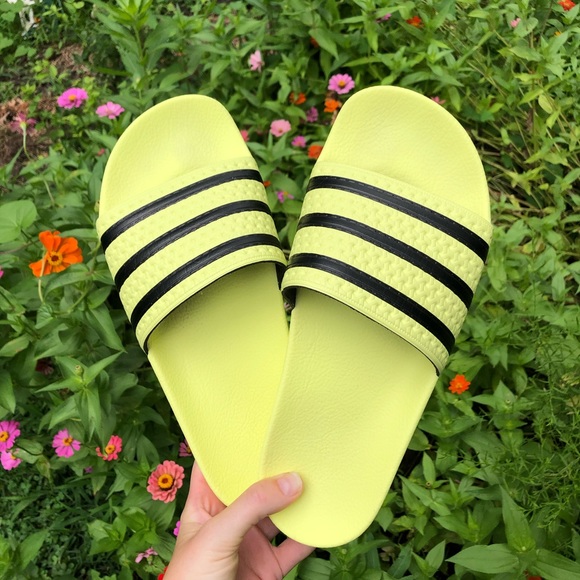 neon yellow adidas slides